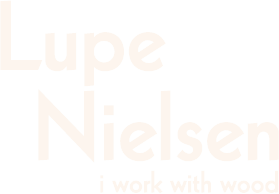 Lupe Nielsen, Fine woodworker logo